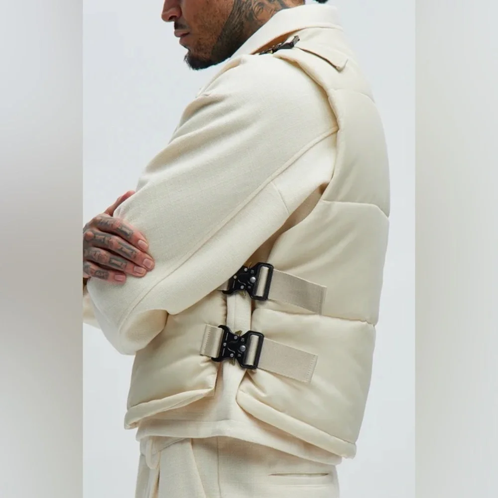 Roller Coaster Puffer Vest" in Off White from the brand Fashion Nova. - Picture 3 of 10